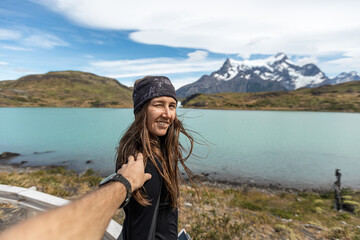 A portrait of a beautiful young woman, Torres del Paine National Park, Chile