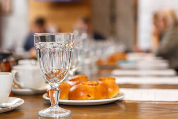 Empty wine glasses are on the table in the restaurant.