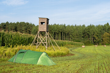 Camping in the field under a wild tower, Gransee, Germany