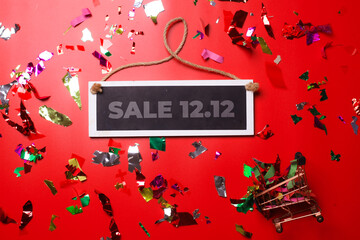 12.12 Shopping day super sale flat lay concept on red background  