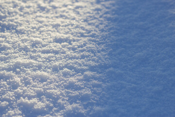 Obraz premium snow textured surface with cold blue shadow and shining cristals