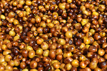 Fresh coffee berries, drying stage, coffee beans in detail, background