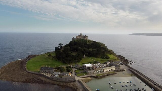 St Michael's Mount near Penzance in Cornwall, England Drone Aerial View - Slow Moving Forward Coast-side (Close)