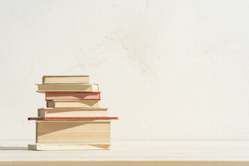 Stack of miniature old books.