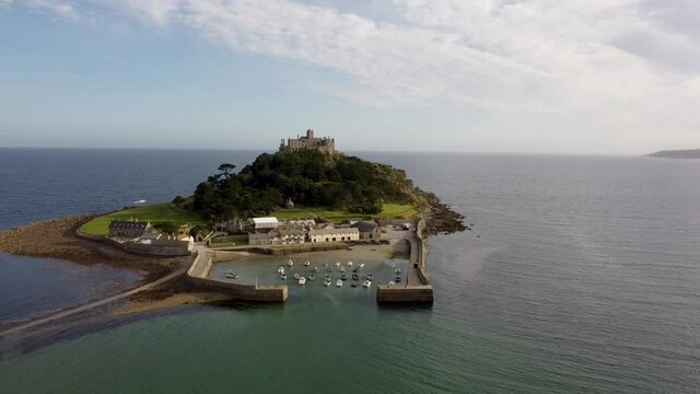 St Michael's Mount near Penzance in Cornwall, England Drone Aerial View - Orbit Left to Right Coast-side