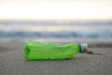 Used Plastic bottle waste discarded on sea coast ecosystem,environmental pollution contamination