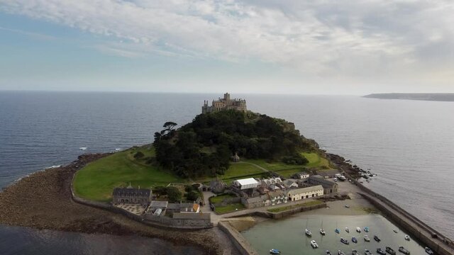 St Michael's Mount near Penzance in Cornwall, England Drone Aerial View - Slow Moving Forward Coast-side (Close)