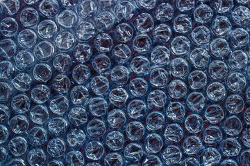 Dark blue plastic bubble wrap texture, abstract background
