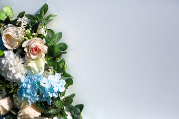 Plain background with flowers. Greeting card.