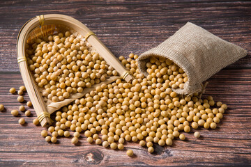 Soybean seeds on wooden background