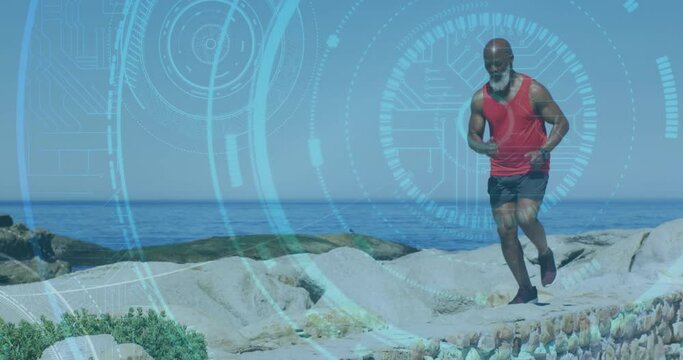 Round scanners against african american senior man running on the rocks