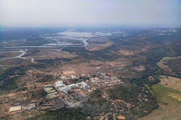 Aerial landscape of India, with nice white clouds in the atmosphere, image shot in the sky from aeroplane. Nature stock image.