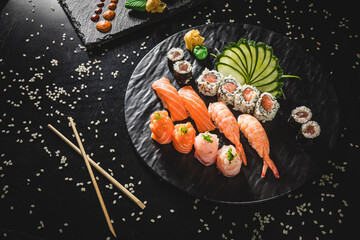 Fototapeta na wymiar Perfect Sushi Japanese Asian Seafood Food Dish Menu Gourmet Restaurant Chef on Dark Background 