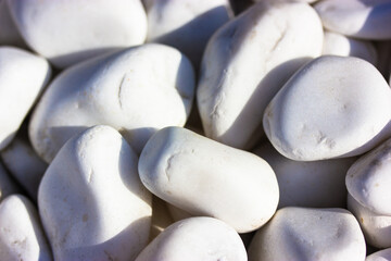 Marble stones used to decorate homes interiors, in gardening. Pebbles decorative