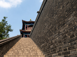 Steep stairs to historic City Wall near Yongning Gate (South Gate) in Xi'an, Shaanxi, China, constructed during the early years of the Sui Dynasty and the landmark of the city.