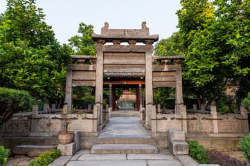 Stone archway and courtyard at Historic Great Mosque in Chinese style at Muslim Quarter, Xi'an, Shaanxi, China, first build in 8th Century. Heirtage and tourist attraction.