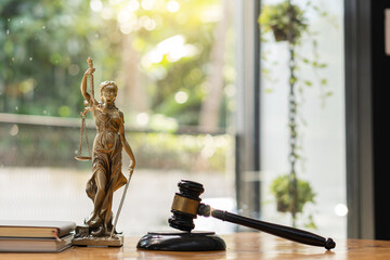 statue of justice Goddess of Justice and Judge's Hammer concept of the trial judicial process and...