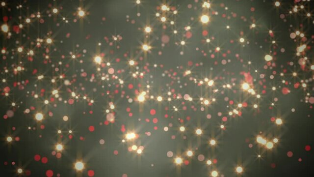 Animation of glowing christmas spots falling on green background