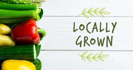 Animation of locally grown text in green over fresh organic vegetables on wooden boards - Powered by Adobe