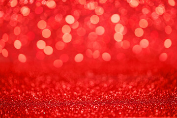 Red glitter lights sparkling bokeh abstract background with defocused lights Christmas.