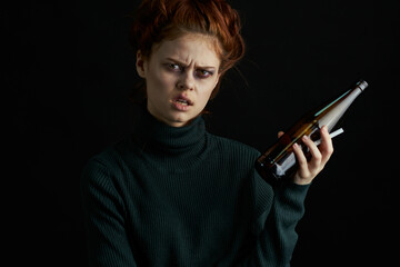 woman with bottle of alcohol bruises under eyes changes depression dark background