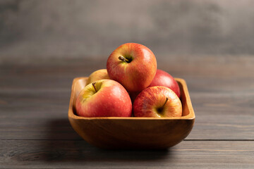 a bowl with red apples close-up