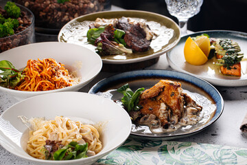 Set of different gourmet mediterranean dishes on the table