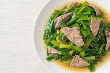 Stir-fried onion flower stem with pork liver