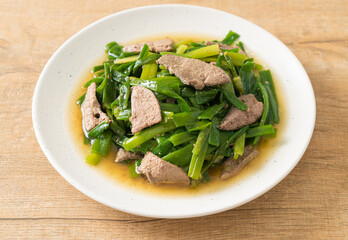 Stir-fried onion flower stem with pork liver