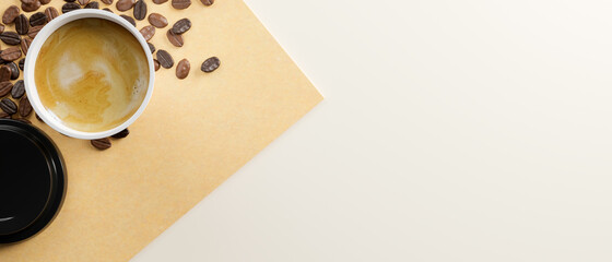 Top view, flat lay image of hot coffee cup and copy space on white background.