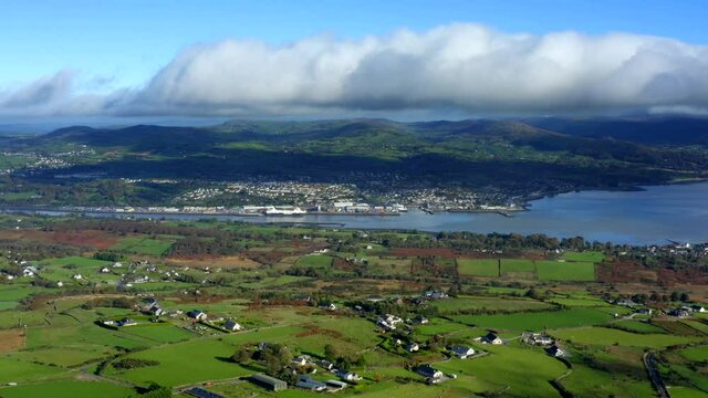 Carlingford Lough, Louth, Ireland, October 2021. Drone pushes north above Omeath towards Warrenpoint in Northern Ireland.