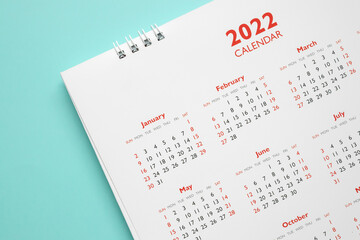 2022 calendar page on blue background business planning appointment meeting concept