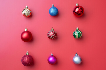 Christmas ball bauble pattern minimal flatlay on red background top view