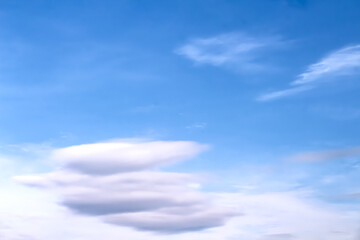 Soft cloud patterns on blue sky background