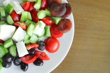 Breakfast with fresh vegatables, olives, cheese and dry fruits