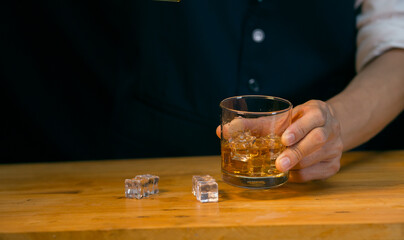 Barman pouring whiskey whiskey glass beautiful night