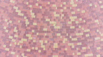 Brick pavement tile, top view. Urban texture as background.