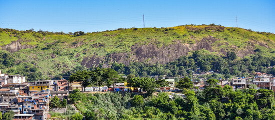 Photograph of low-income peripheral community popularly known as “favela” in Rio de Janeiro, Brazil © @renatopmeireles