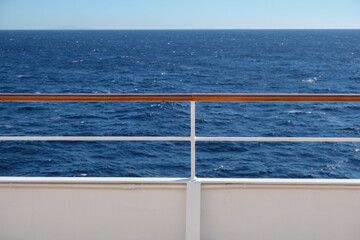 Detail view of Reling and deck floor of modern cruiseship cruise ship liner at sea