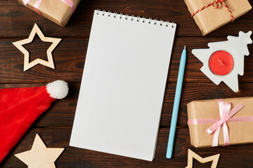 Blank notepad on background of christmas accessories