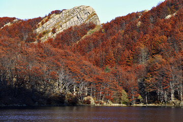 Santo mountain lake and autumn forest foliage, Appennino, italy, parma