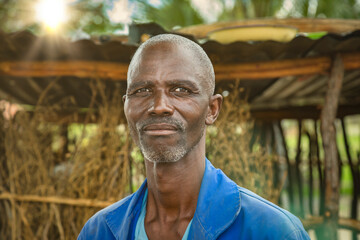 African elderly farmer - obrazy, fototapety, plakaty