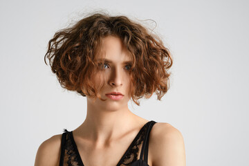 Closeup portrait of young woman with wild hair