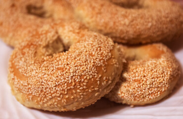 Bagels with sesame seeds, freshly baked bagels close - up view