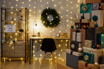 decorated home office with heap of gifts and christmas decorations