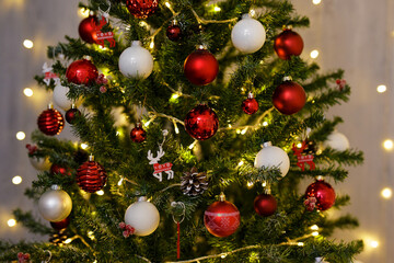decorated Christmas tree with colorful baubles and festive led lights