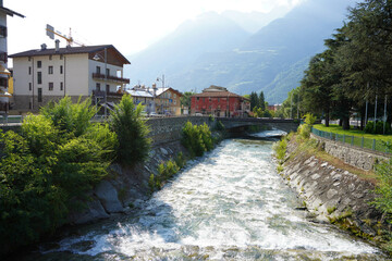 Fototapeta na wymiar Dora Baltea River and Aosta cityscape in Aosta Valley, Italy