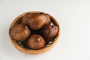 Salak or thorny palm or snake fruit (Salacca zalacca) is a species of palm tree. Selective focus image. Close up.
