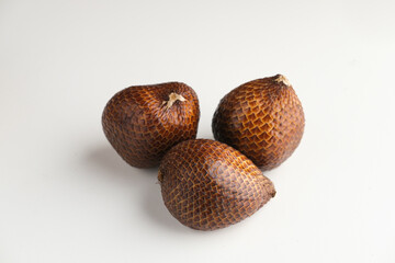 Salak or thorny palm or snake fruit (Salacca zalacca) is a species of palm tree. Selective focus image. Close up.
