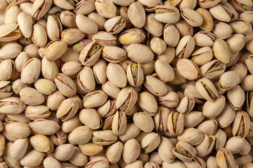 Pistachio texture. Nuts. Green fresh pistachios as texture.